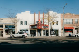 Street with Roxy Theater.