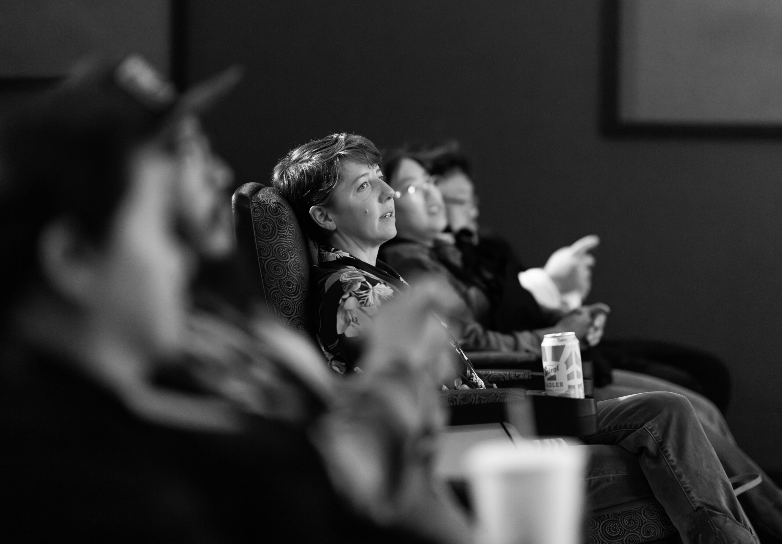 MTFF-DayTwo-27 Black and white image of crowd looking up at movie screen.