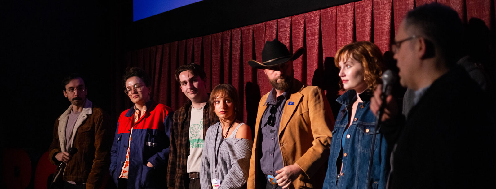 Group of people on stage for a talk back.