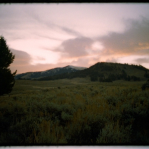 Image of mountains and grass.